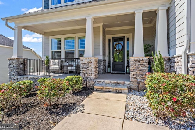 property entrance with a porch