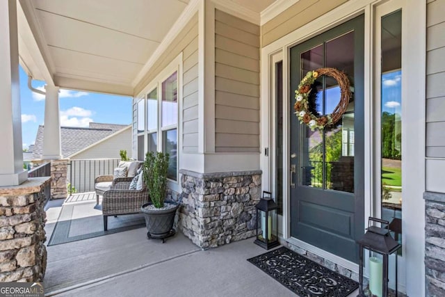 property entrance with covered porch