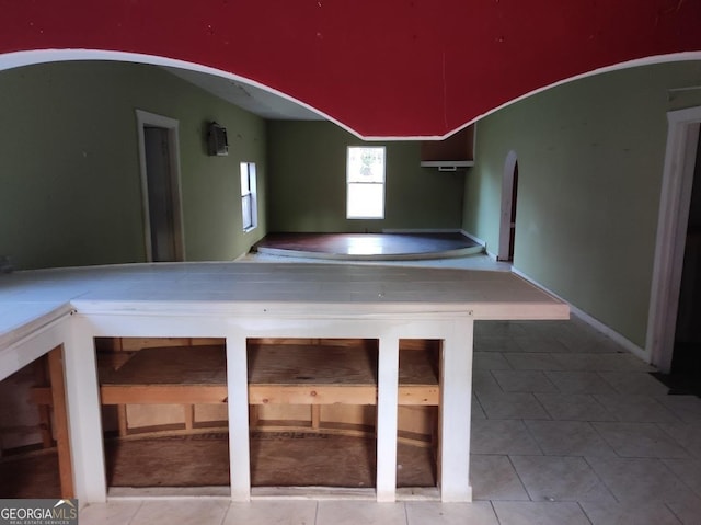 interior space featuring tile patterned flooring