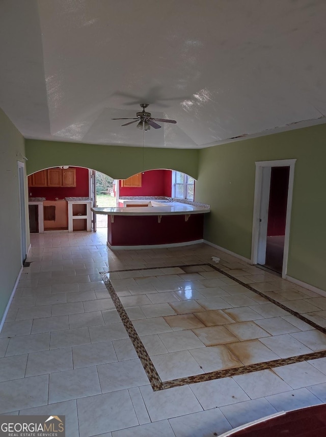 view of patio / terrace featuring ceiling fan