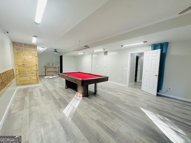 playroom with light hardwood / wood-style flooring and billiards