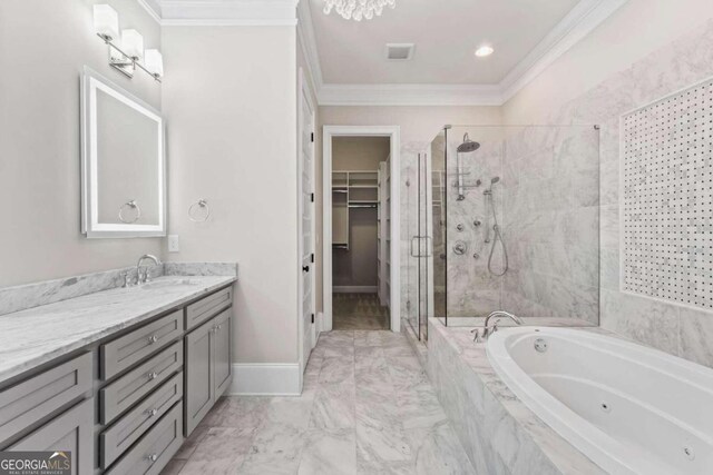 bathroom with separate shower and tub, vanity, and ornamental molding