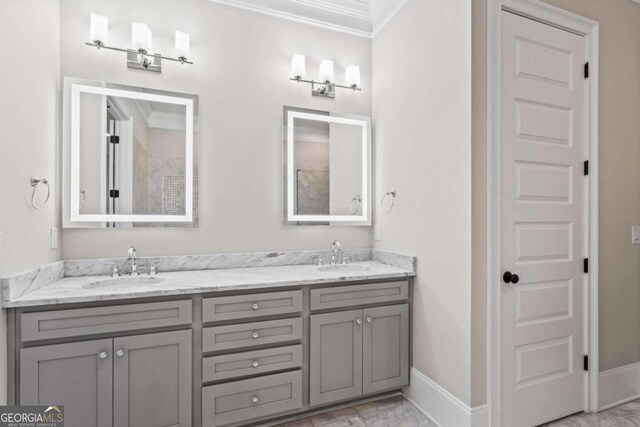 bathroom featuring vanity and ornamental molding