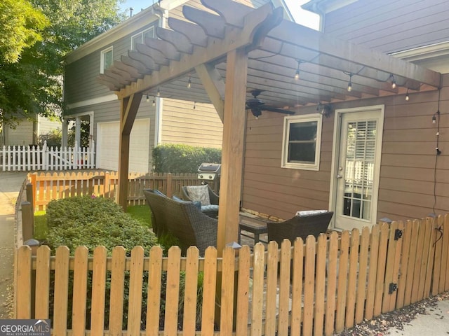 view of patio / terrace with a pergola and ceiling fan