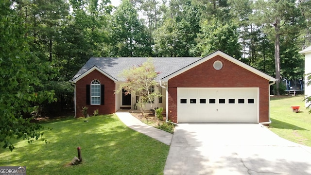 ranch-style home featuring a front yard and a garage