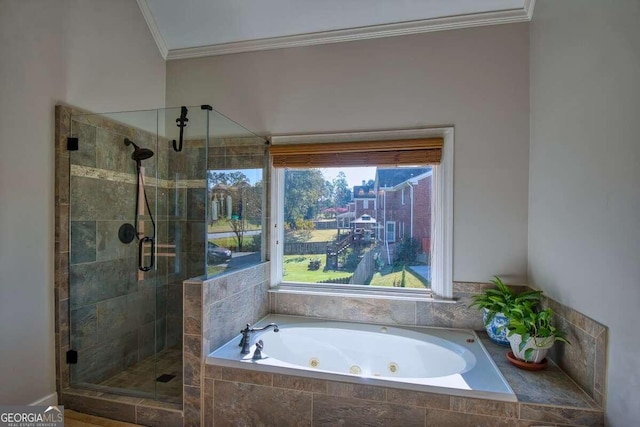 bathroom featuring shower with separate bathtub and ornamental molding