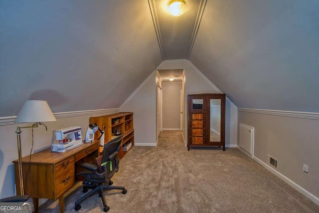 office area with light colored carpet and lofted ceiling