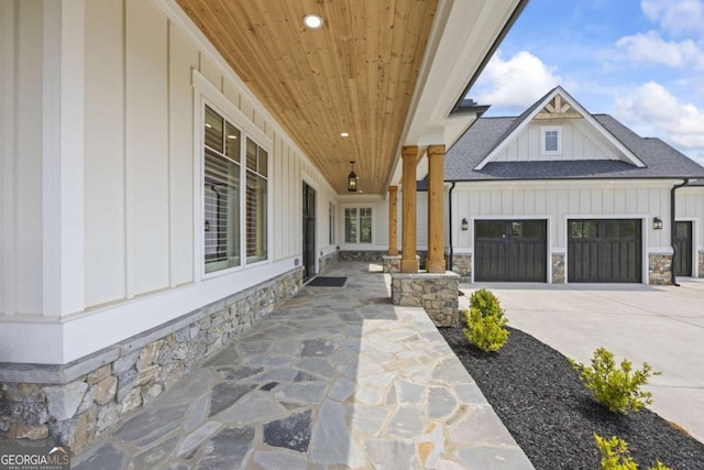 view of patio with a garage