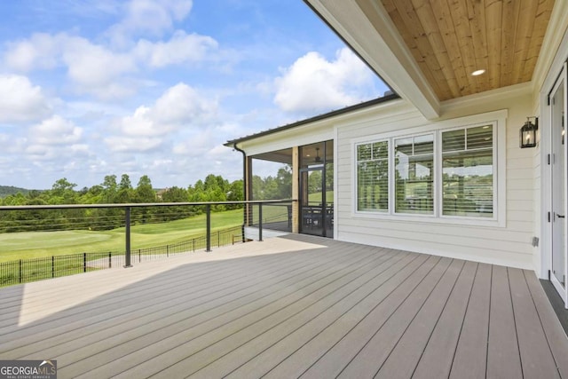 deck with a sunroom