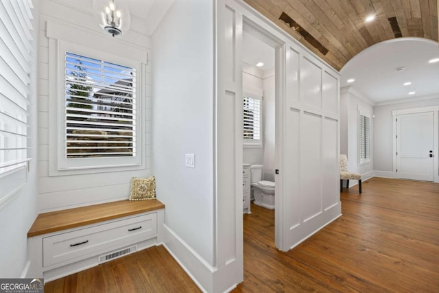 hallway featuring wooden ceiling and dark wood-type flooring