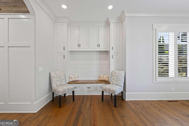 living area with dark hardwood / wood-style flooring