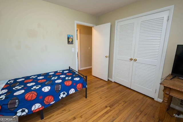 bedroom featuring hardwood / wood-style floors