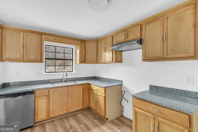 kitchen featuring dishwasher, light stone counters, sink, and light hardwood / wood-style flooring