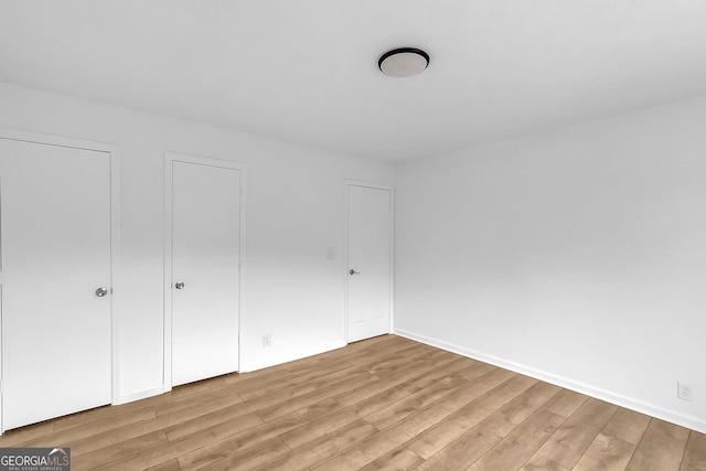 unfurnished bedroom featuring light hardwood / wood-style floors