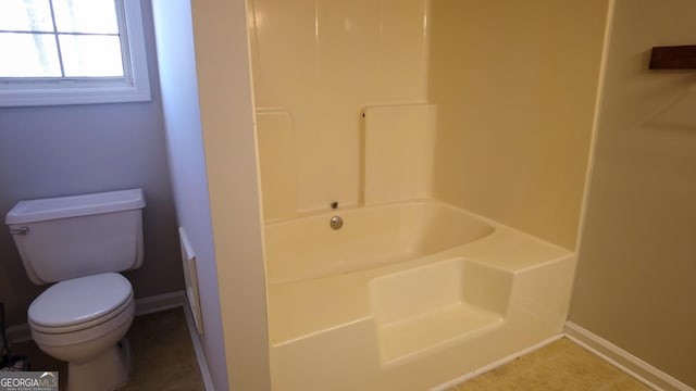 bathroom with separate shower and tub and toilet