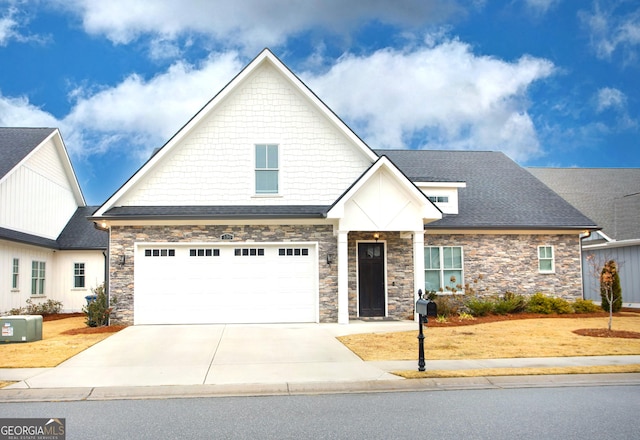 view of front of property with a garage