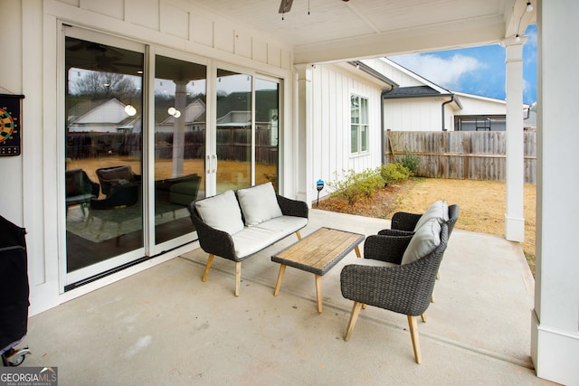 view of patio featuring ceiling fan