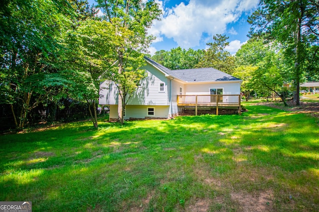 view of yard with a deck