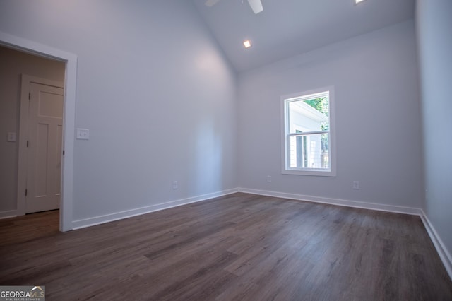 unfurnished room featuring ceiling fan, dark hardwood / wood-style floors, and high vaulted ceiling