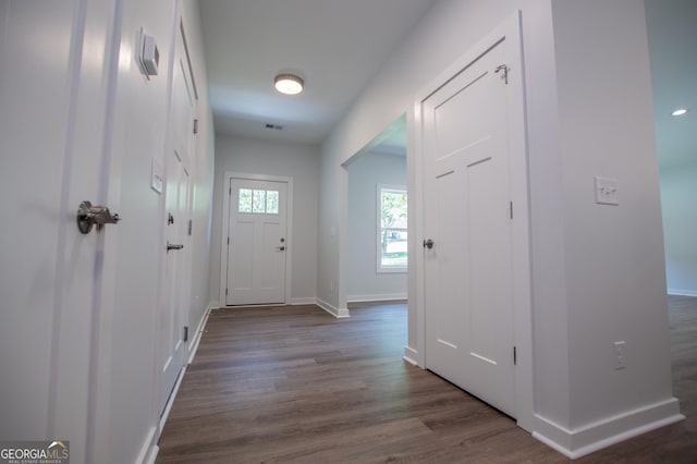 doorway featuring dark hardwood / wood-style flooring