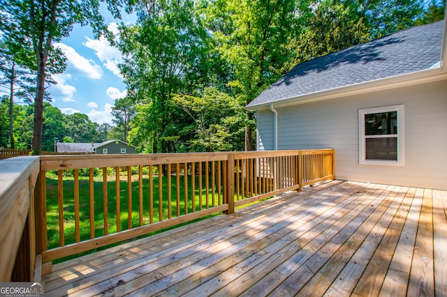 deck featuring a yard