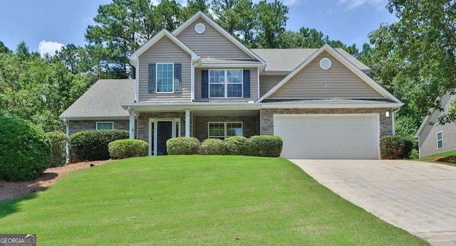 view of front facade featuring a garage and a front lawn