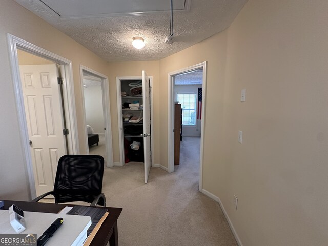 stairs with a textured ceiling