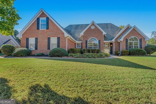 view of property with a front lawn