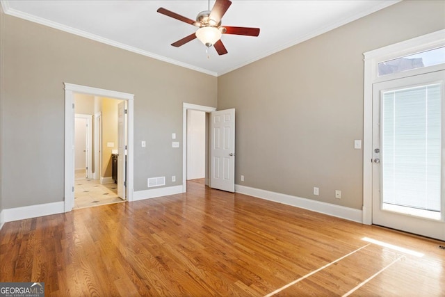 unfurnished bedroom with ensuite bath, ceiling fan, light hardwood / wood-style flooring, and ornamental molding