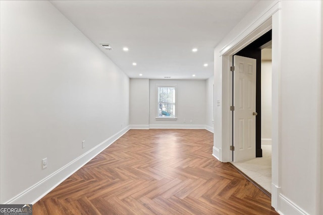 empty room featuring parquet floors