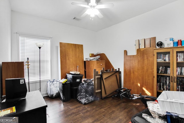 misc room with dark hardwood / wood-style floors and ceiling fan