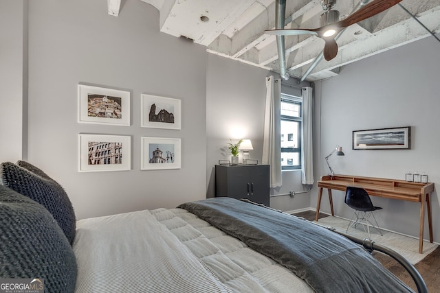 bedroom with hardwood / wood-style flooring