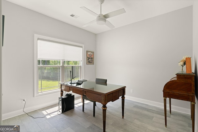 office space with ceiling fan