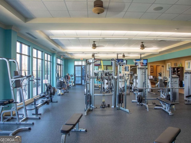 workout area featuring visible vents and a drop ceiling