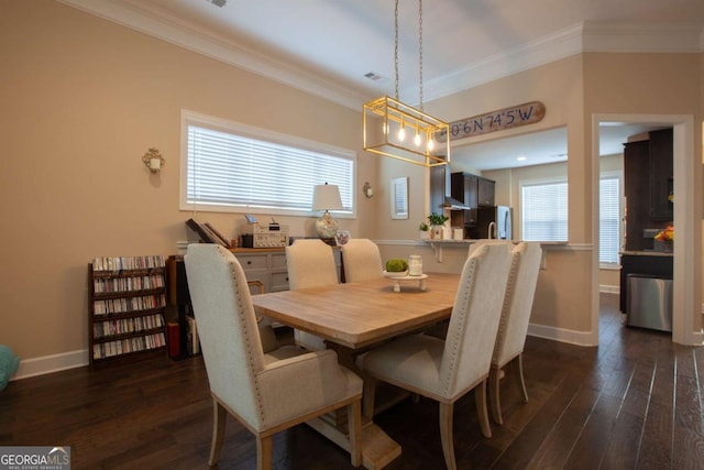 dining space with crown molding, baseboards, and dark wood-style flooring