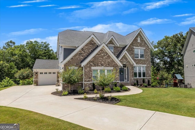 craftsman inspired home with a front yard and a garage