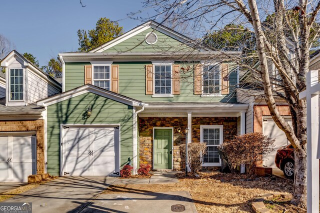 front of property with a garage
