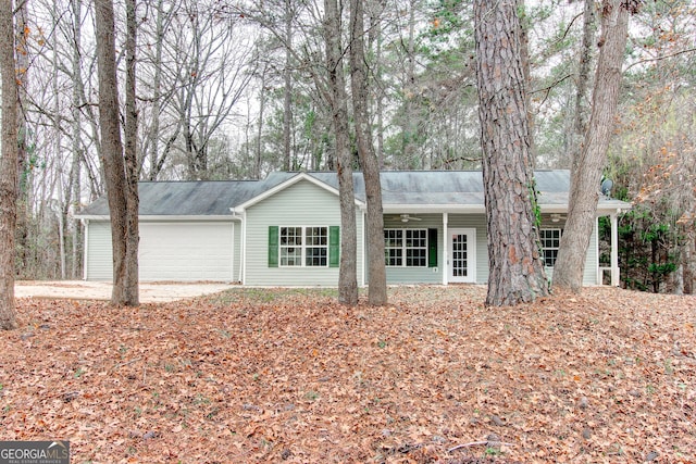 single story home featuring a garage