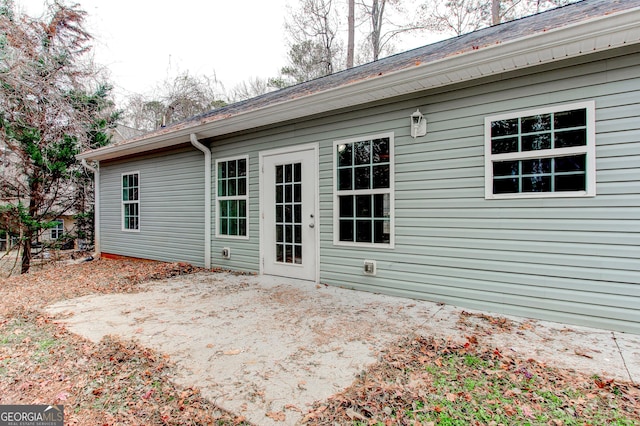 back of property featuring a patio area