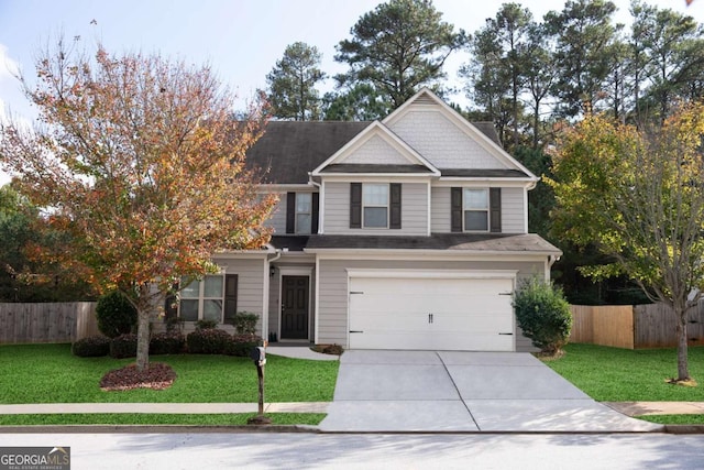 craftsman-style home with a front yard and a garage