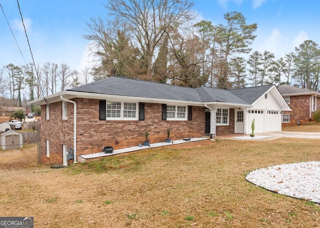 single story home with a front lawn and a garage