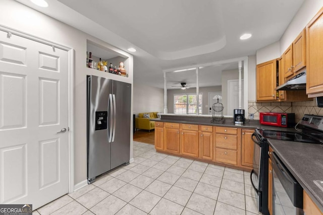 kitchen with black appliances, ceiling fan, light tile patterned floors, and backsplash