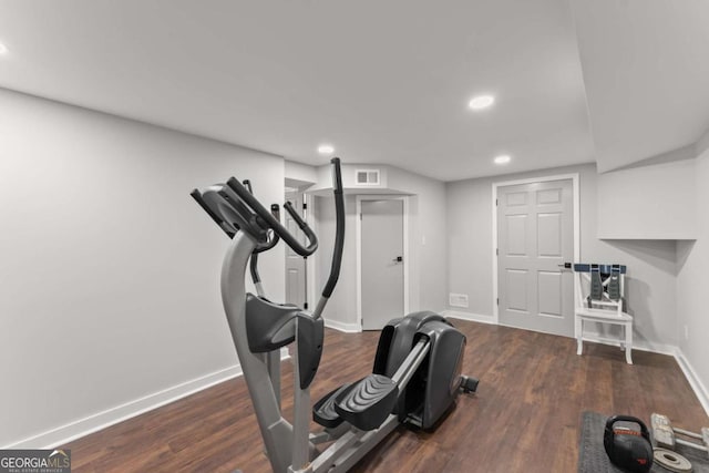 exercise area with dark hardwood / wood-style flooring