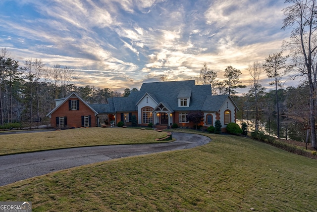 view of front of house with a lawn