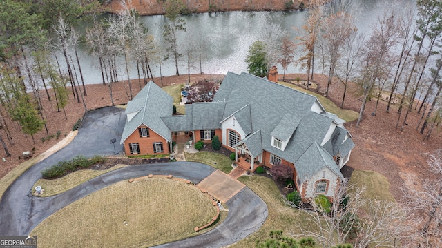 bird's eye view with a water view