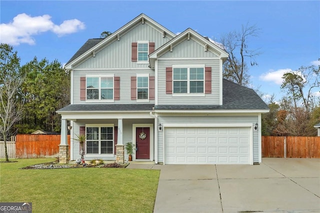 craftsman-style home with a garage and a front lawn