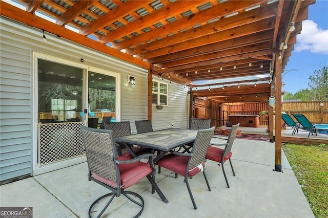 view of patio featuring a hot tub