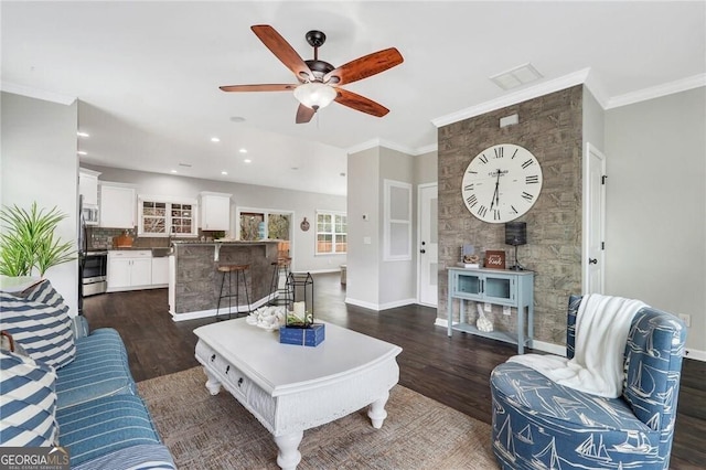 living room featuring crown molding, ceiling fan, and dark hardwood / wood-style floors