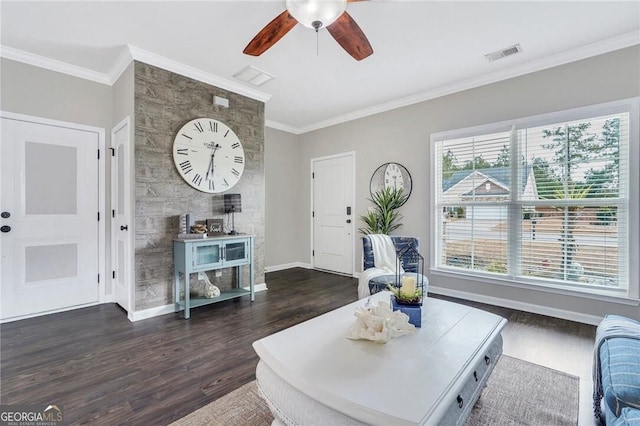 living room with ornamental molding and dark wood-type flooring