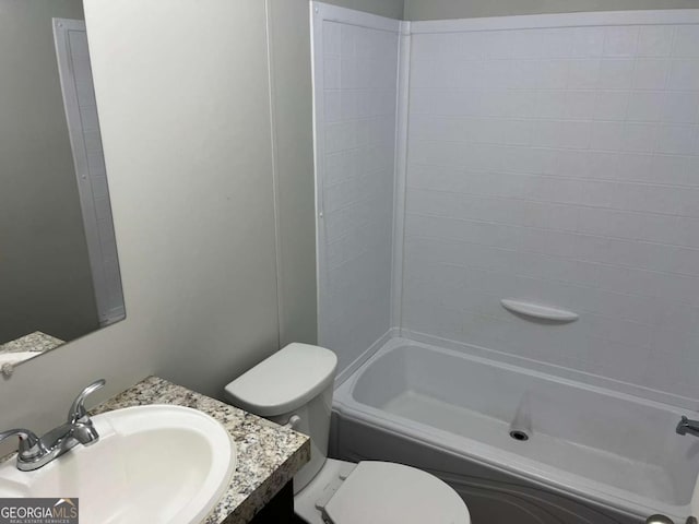 full bathroom with vanity,  shower combination, and toilet